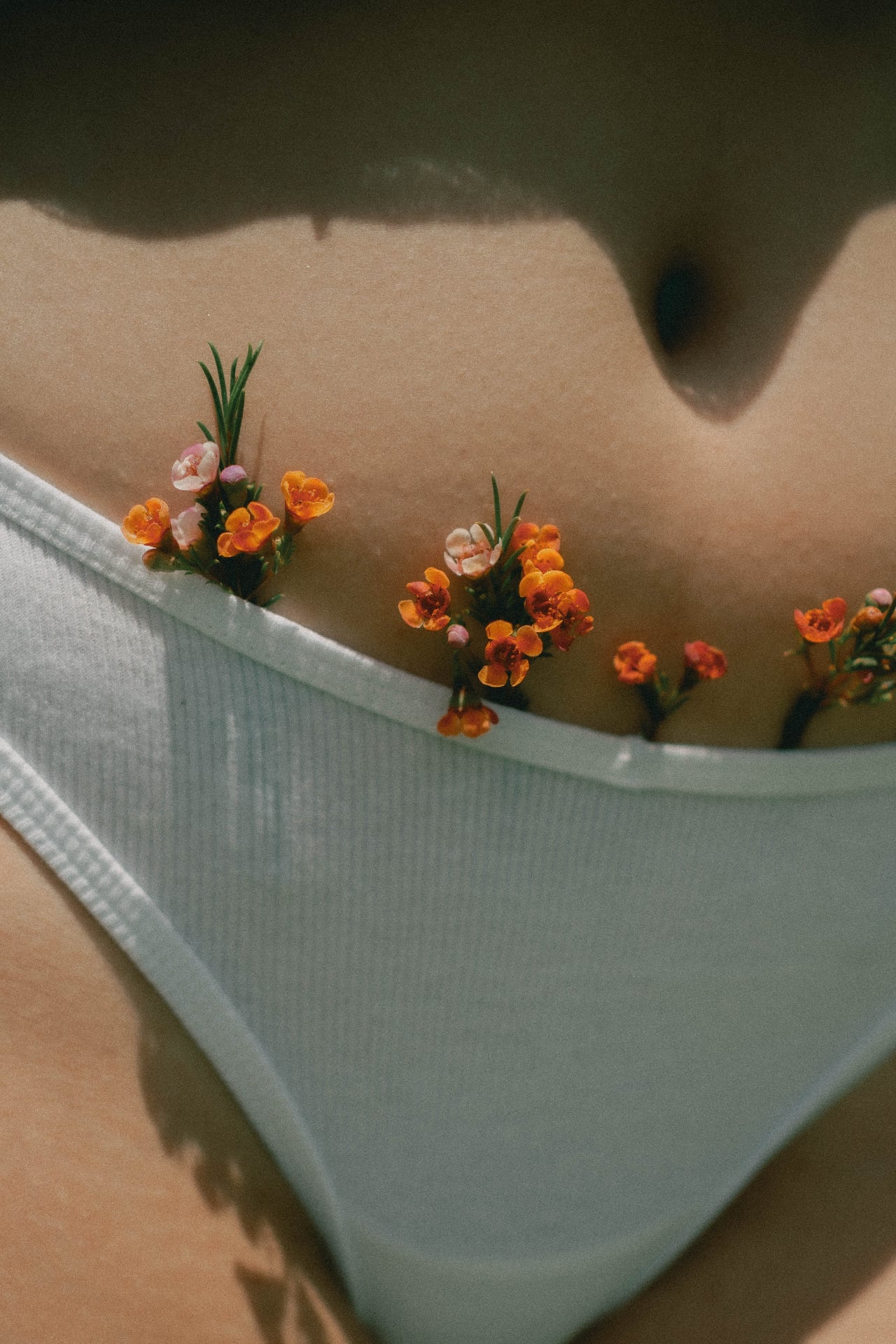 A florist working in soft natural light